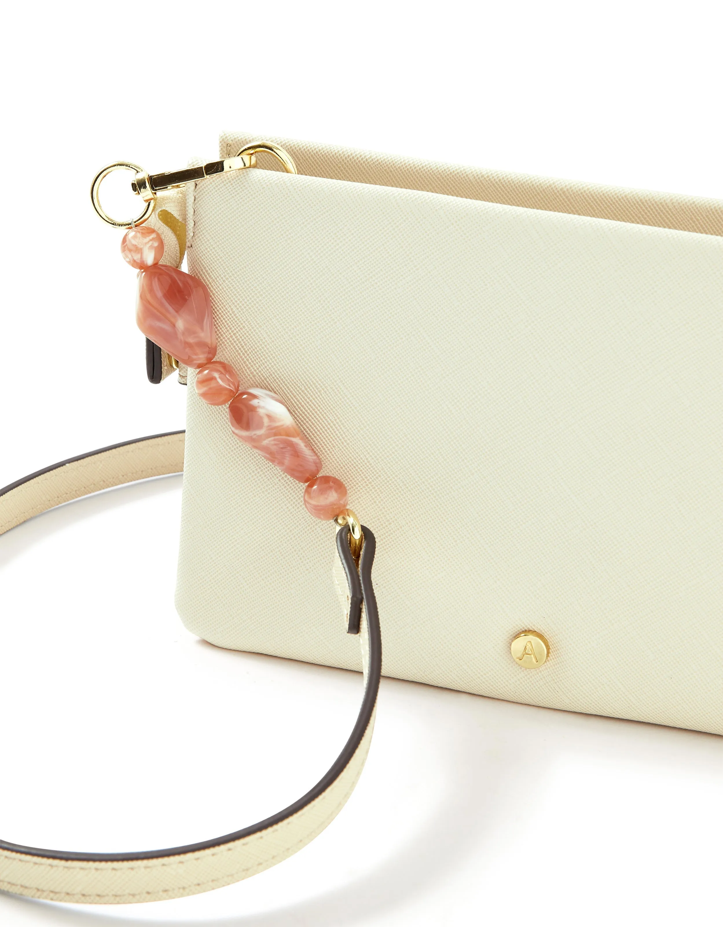 Accessorize London women's Faux Leather Pink Beaded Strap Sling bag